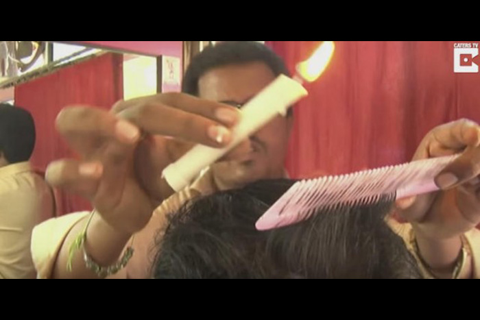 薄毛＝死。灼熱の炎で焼き切る「インド式ヘアカット」が怖すぎる！