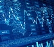 Digital,Candlestick,Chart,Over,A,World,Map,In,Blue.,Ideal