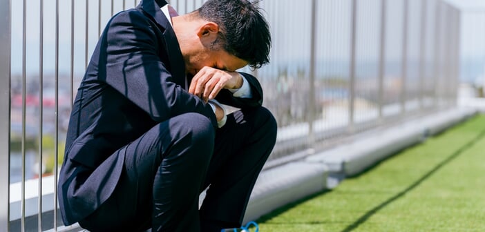 A,Businessman,Feeling,Down,On,The,Roof,(unemployment,,Restructuring,,Dejected,