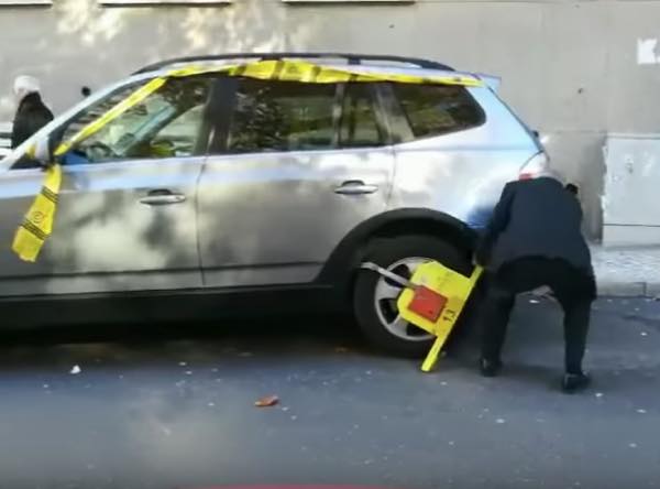 駐車禁止　拘束具　爺さん