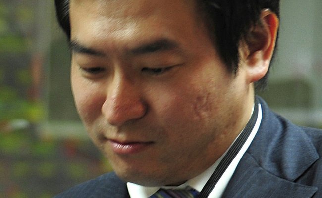 Japanese Parliamentary Secretary for Defense Tsukasa Akimoto, right, admires the glass globe presented to him April 28, 2008, by U.S. Air Force Maj. Gen. Maurice H. Forsyth, deputy commander of Combined Force Air Component, in honor of his visit to the Combined Air and Space Operations Center in southwest Asia. (U.S. Air Force photo by Staff Sgt. Christina M. Styer) (Released)