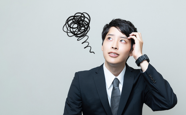 Confused,Young,Asian,Businessman.