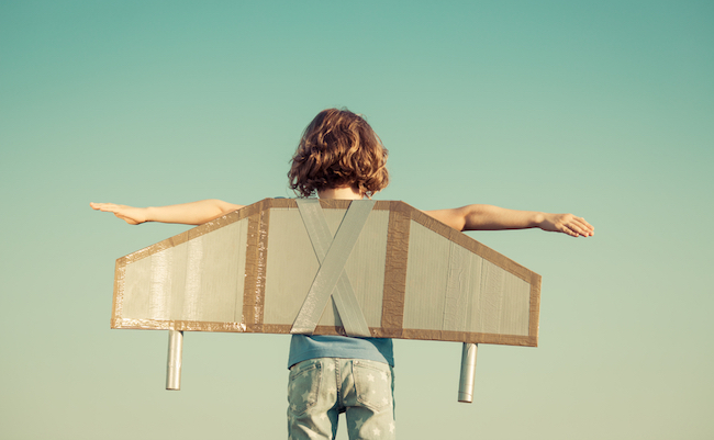 Happy,Child,Playing,With,Toy,Wings,Against,Summer,Sky,Background.