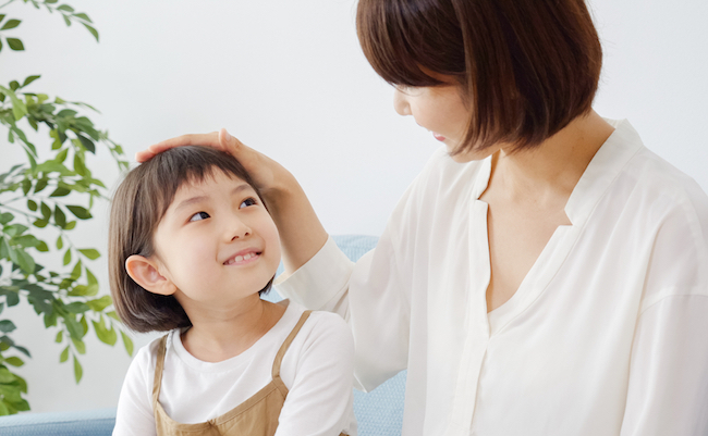 Asian,Family,In,Living,Room