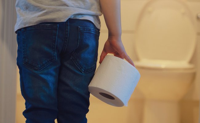 Rare,View,Of,Kid,Holding,Toilet,Roll,In,The,Front