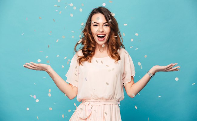 Portrait,Of,A,Cheerful,Beautiful,Girl,Wearing,Dress,Standing,Standing