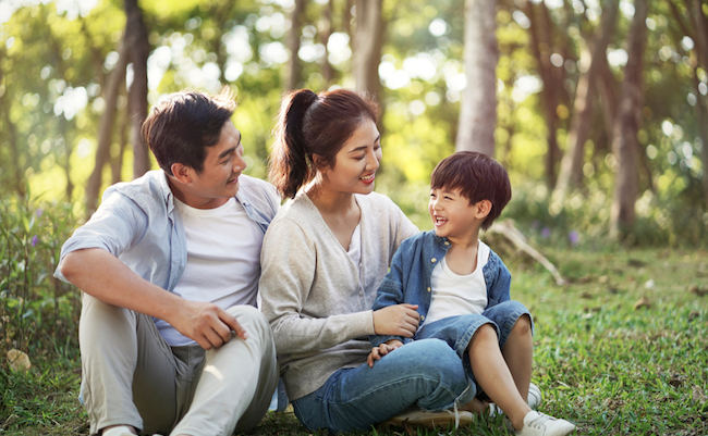 Young,Asian,Parents,And,Son,Having,Fun,Outdoors,In,Park