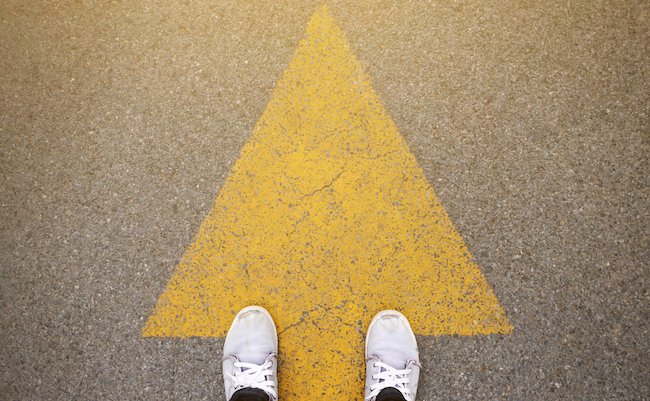 Feet,And,Arrows,On,Road.