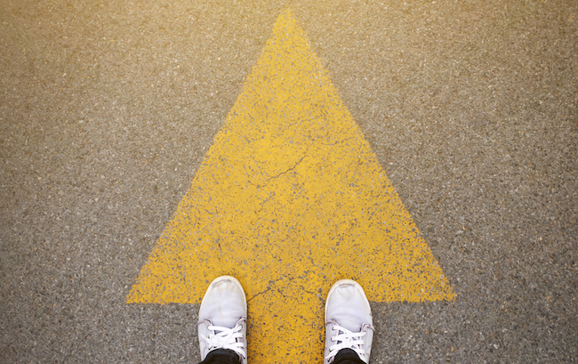 Feet,And,Arrows,On,Road.