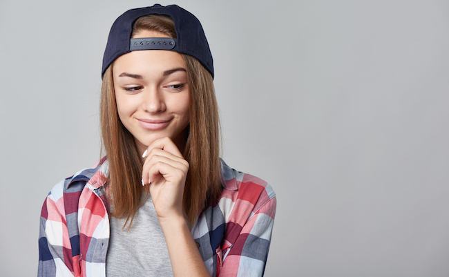 Closeup,Portrait,Of,Smiling,Teen,Girl,Wearing,Checkered,Shirt,And