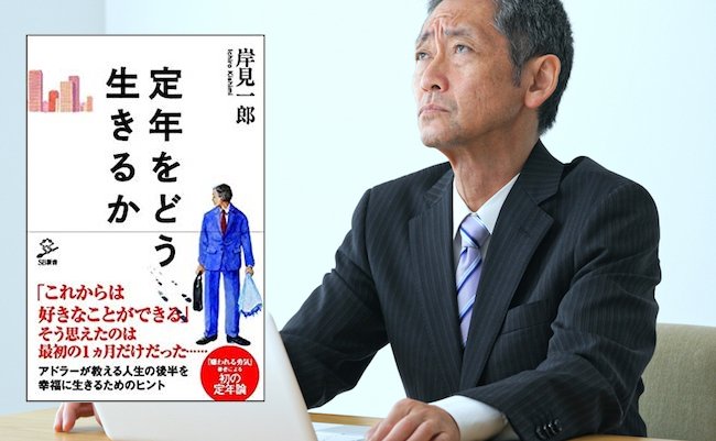 Thinking middle aged businessman with a laptop computer.