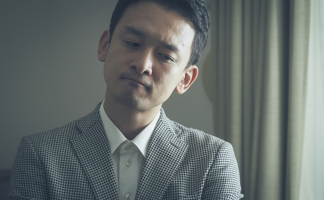 Asian,Businessman,Thinking,In,The,Room