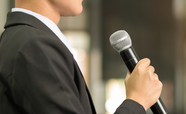 Asian,Smart,Businessman,Speech,,Talking,With,Microphone,In,Seminar,Conference