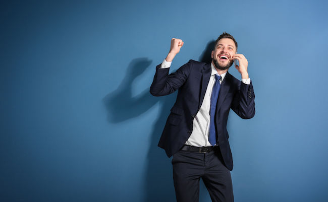 Stock,Exchange,Broker,Talking,On,Phone,Against,Color,Background