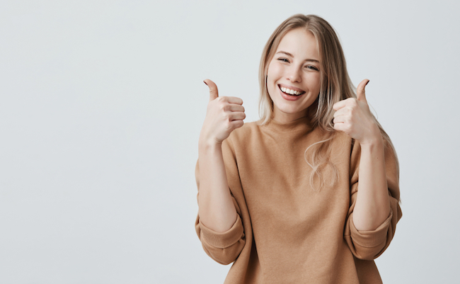 Portrait,Of,Fair-haired,Beautiful,Female,Student,Or,Customer,With,Broad