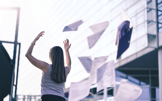 Business,Woman,Throwing,Work,Papers,In,The,Air.,Stress,From