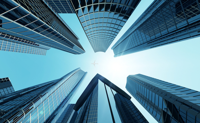 Corporate,Building,In,City,Downtown,District,With,Sun,Light,And