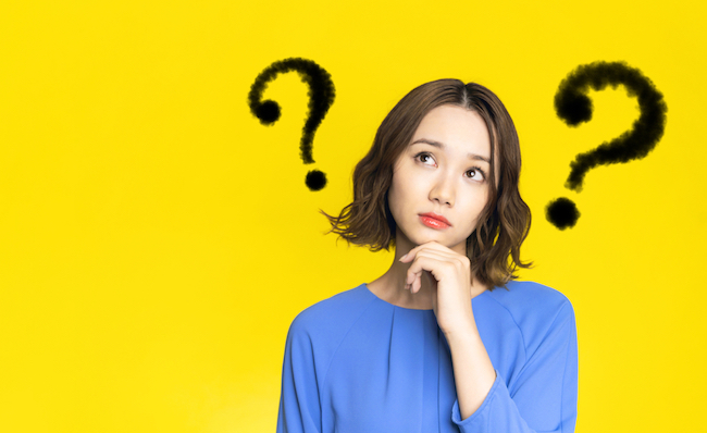 Young,Woman,With,Question,Marks.