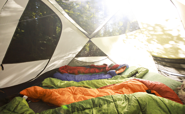Sleeping,Bags,Lined,Up,In,A,Tent,Full,Of,Sleeping