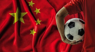 Soccer,Football,Player,On,China,Flag,Background