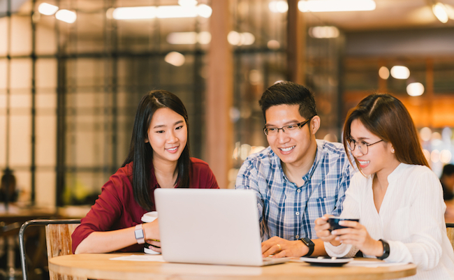 Young,Asian,College,Students,Group,Or,Coworkers,Using,Laptop,Computer