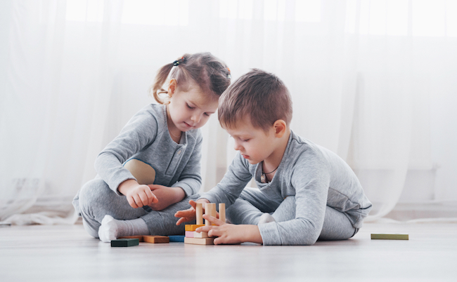 Children,Play,With,A,Toy,Designer,On,The,Floor,Of