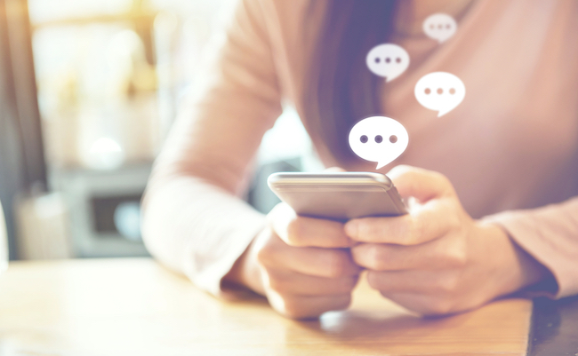 Women’s,Hand,Typing,On,Mobile,Smartphone,,Live,Chat,Chatting,On