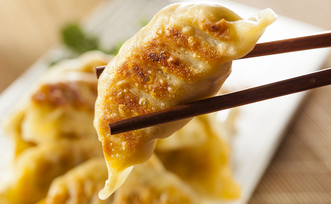 Homemade Asian Vegeterian Potstickers with soy sauce and pork