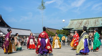 Kyoto, Japan - November 2, 2013: Kemari, a ball game that was popular in Japan during the Heian period, played at Kyoto Imperial Palace with participants dressed in elaborate court clothes