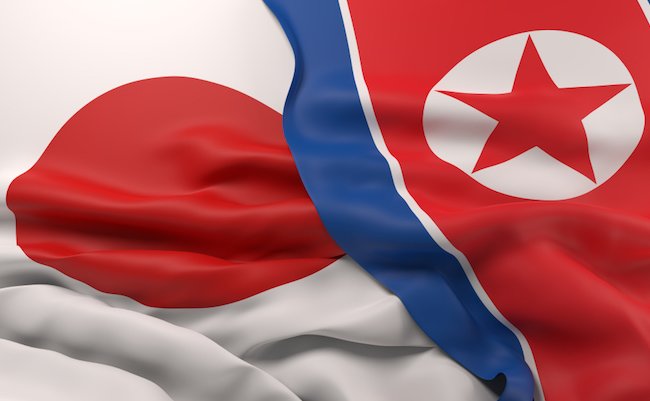 Flags of Japan and North Korea 3D Render