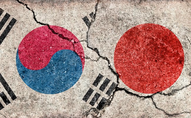 Grunge country flag illustration (cracked concrete background) / Japan vs South korea (Political or economic conflict)