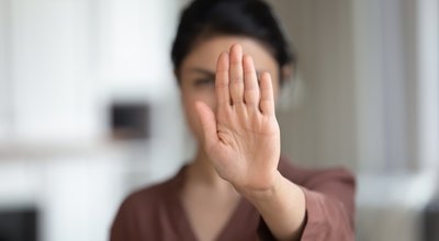 No. Courageous young female extend hand in stop gesture oppose against domestic sexual violence abuse racial gender discrimination. Millennial lady rebel against violation of women rights. Copy space