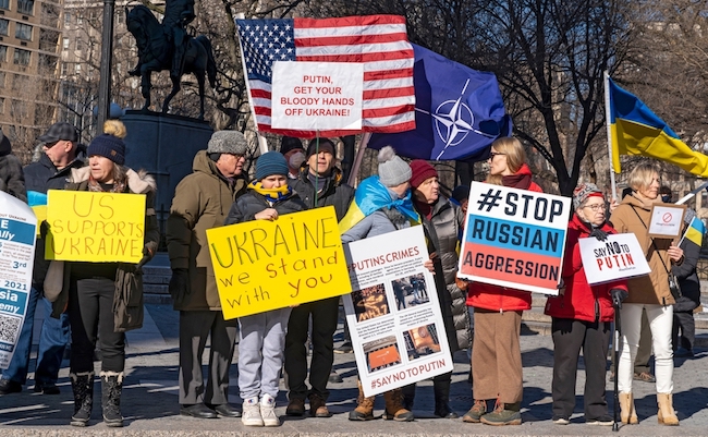 NEW YORK, NY - JANUARY 22, 2022: Hundreds of people holding signs and flags participated at a "Stand With Ukraine" rally in Union Square amid threat of Russian invasion of the Ukraine.