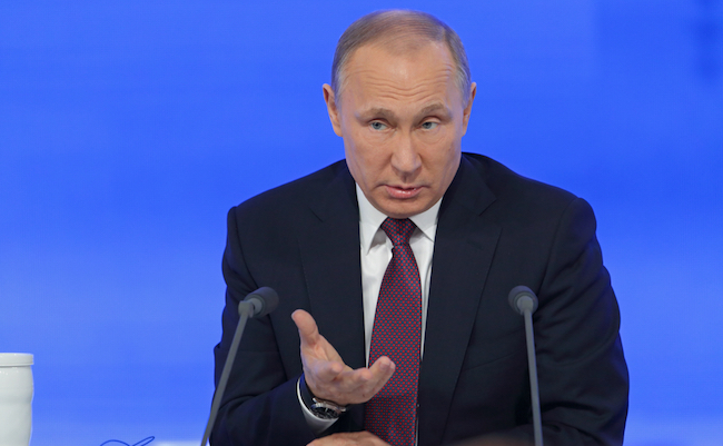 MOSCOW, RUSSIA - DEC 23, 2016: The President of the Russian Federation Vladimir Vladimirovich Putin with eyes closed at the annual press conference in Center of international trade