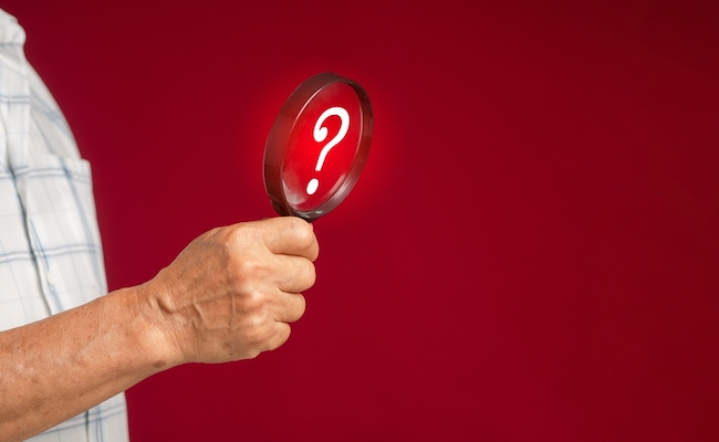 Question,Mark,Concept.,Close-up,Of,Hand,A,Senior,Man,Holding