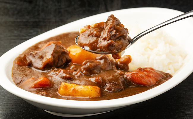 Beef curry served on a plate