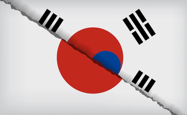 concept of economic and patriotic confrontation between the two countries. Flags of Japan and South Korea
