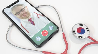 Doctor calling on smartphone app and stethoscope with the South Korean flag. Telehealth technology in South Korea. 3D rendering