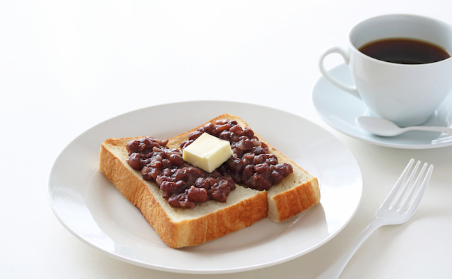 Toast with Japanese Adzuki bean paste and Butter on white plate