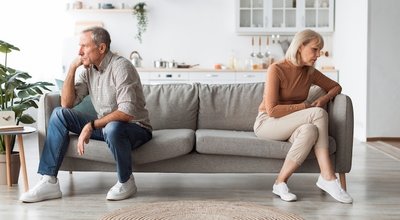 Marital Crisis Problem. Offended Mature Spouses Sitting Back-To-Back Not Speaking After Quarrel On Sofa At Home. Senior Spouses Thinking About Divorce Having Conflict. Issues In Relationship