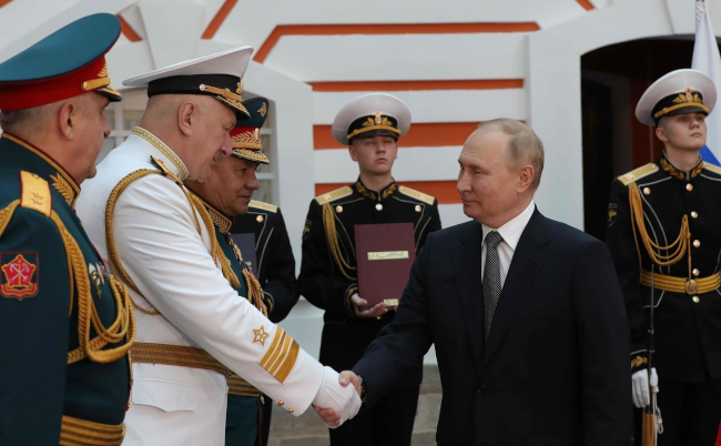Russia’s,President,Vladimir,Putin,(c),Shakes,Hands,With,Commander-in-chief,Of