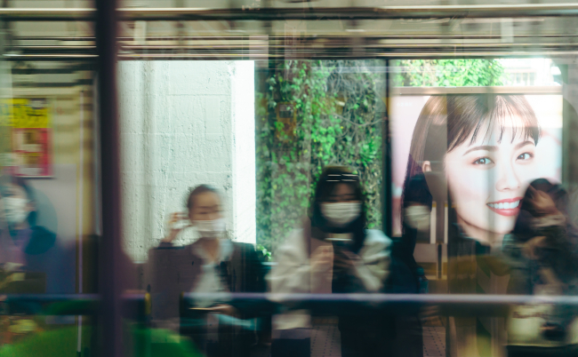 Tokyo,,Japan,-,November,7,2022:,Women,In,Mask,Traveling