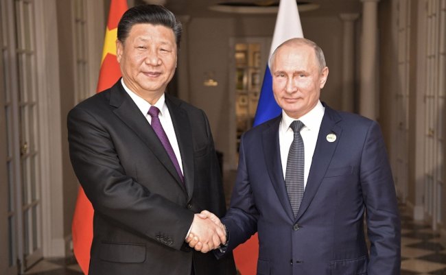 Russian,President,Vladimir,Putin,(r),Meets,With,His,Chinese,Counterpart
