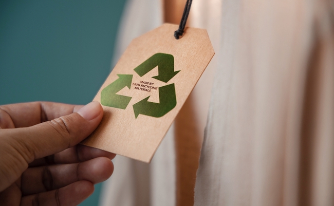 Recycling Products Concept. Organic Cotton Recycling Cloth. Zero Waste Materials. Environment Care, Reuse, Renewable for Sustainable Lifestyle. Recycle Icon show on Tag