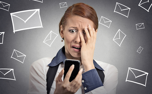 Upset,Stressed,Woman,Holding,Cellphone,Disgusted,Shocked,With,Message,She