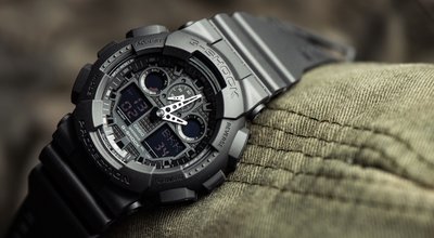 BANGKOK, THAILAND - JANUARY 09, 2020: Casio G-Shock model GA-100-1A1, black sports wristwatch. G-Shock is a line of watches manufactured by Casio.