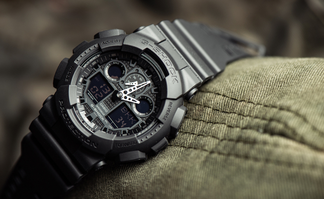 BANGKOK, THAILAND - JANUARY 09, 2020: Casio G-Shock model GA-100-1A1, black sports wristwatch. G-Shock is a line of watches manufactured by Casio.
