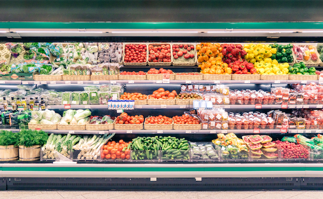 Fresh vegetables on shelf in supermarket for background