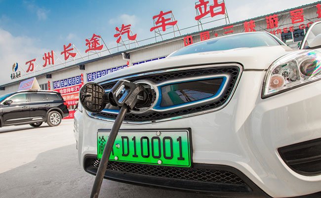 Chongqing, China - July 14, 2018: Electric vehicles are charging at the station with charging piles, in Chongqing, China