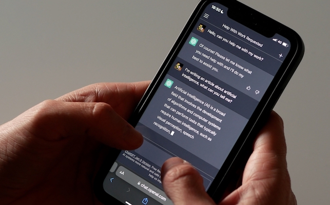 JANUARY 13, 2023: ChatGPT iPhone Screen Close-up of an Example of Chat a Person Can Have with It